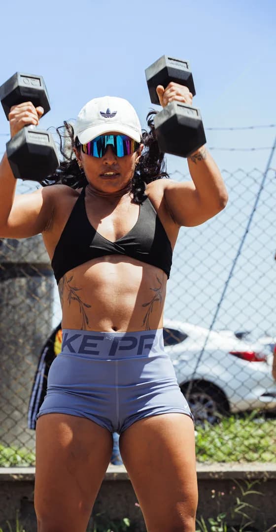 Woman lifting dumbbells